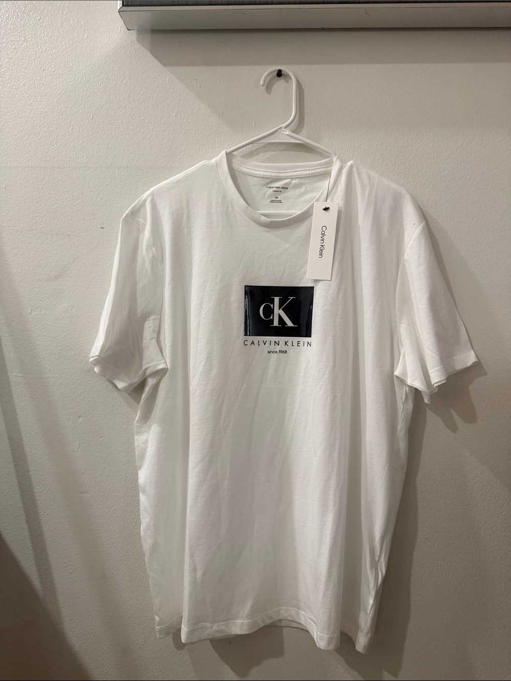Calvin Klein White Tee with Black CK Patch